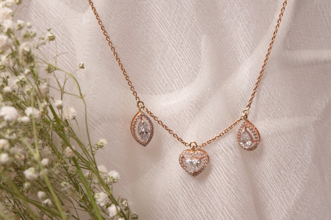 An oval-cut, pear-cut, and heart-cut diamonds
