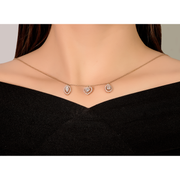 An oval-cut, pear-cut, and heart-cut diamonds