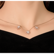 An oval-cut, pear-cut, and heart-cut diamonds